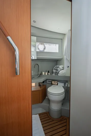  Yacht Photos Pics 2019 Bluegame BG42 yacht bathroom with modern fixtures and wooden accents.