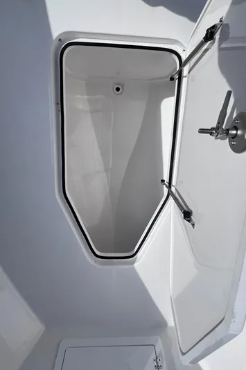  Yacht Photos Pics Open storage compartment on 2025 Reef Runner 280 boat.