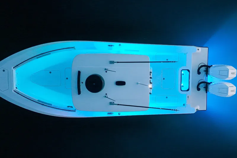  Yacht Photos Pics Overhead view of 2025 Reef Runner 280 boat with blue LED lighting.