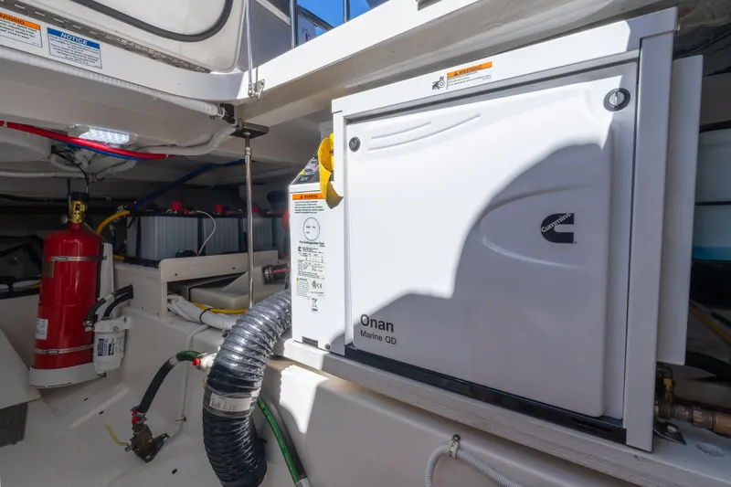 Next Level Yacht Photos Pics Engine room of 2025 Tiara Yachts 43 LE with Cummins Onan generator.
