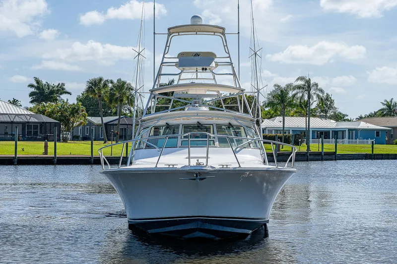 Atica Yacht Photos Pics 2005 Albemarle 410 boat docked on a sunny day.