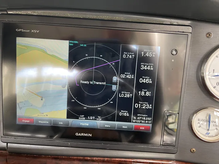  Yacht Photos Pics Garmin GPS display on 2006 Four Winns 350 boat dashboard, showing navigation data.
