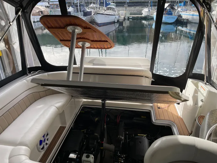  Yacht Photos Pics Interior of a 2006 Four Winns 350 boat with open engine compartment.