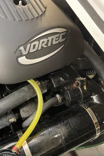  Yacht Photos Pics Engine compartment of a 2006 Four Winns 350 boat featuring a Vortec engine component.