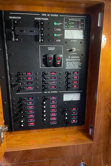 Yacht Photos Pics Electrical panel of a 2006 Four Winns 350 boat, featuring various switches and indicators.