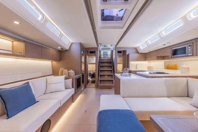  Yacht Photos Pics Luxurious interior of 2026 Grand Soleil 52 Performance yacht, featuring modern design and spacious seating.