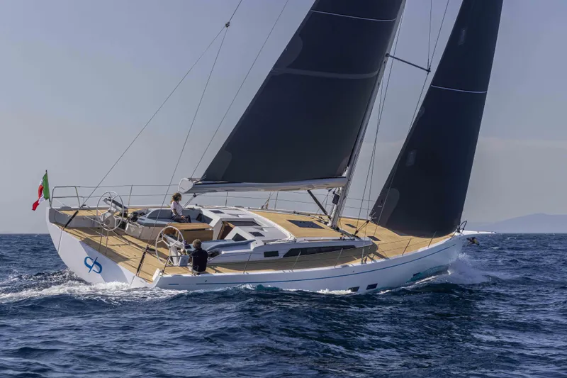  Yacht Photos Pics 2026 Grand Soleil 52 Performance yacht sailing on open water, featuring sleek design and modern sails.