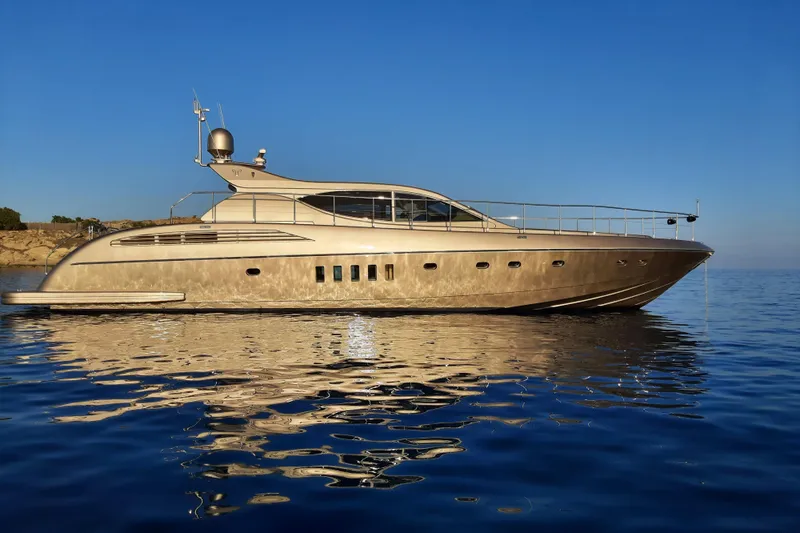  Yacht Photos Pics Luxurious 2006 Arno Leopard 24 yacht on calm blue waters under clear sky.