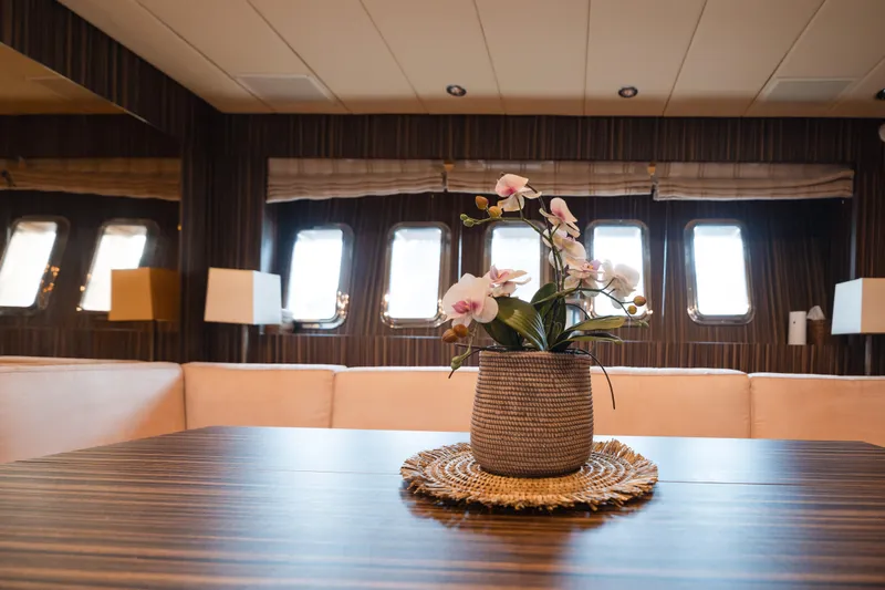  Yacht Photos Pics Luxurious yacht interior with elegant orchid centerpiece, Arno Leopard 24, 2006 model.