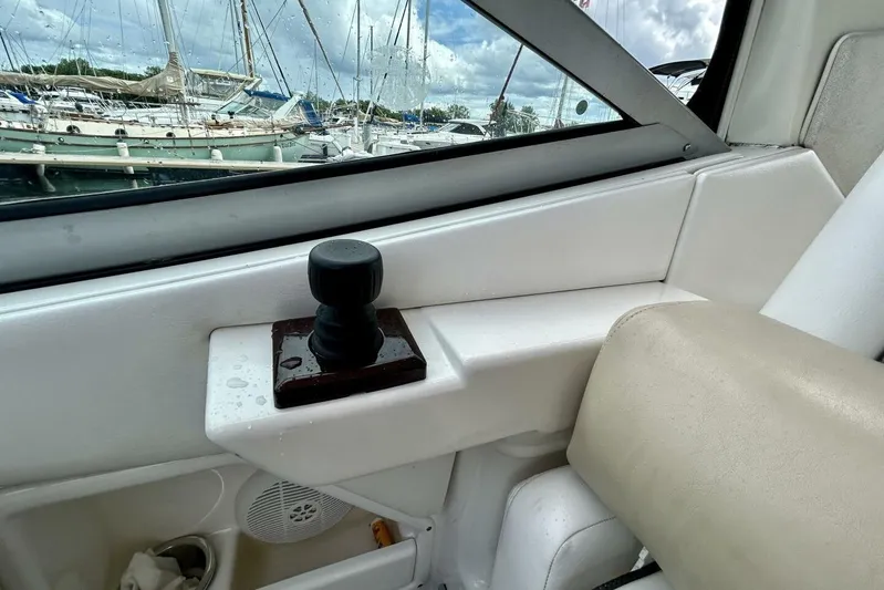  Yacht Photos Pics Interior view of a 2009 Sea Ray 310 Sundancer boat with a joystick control.