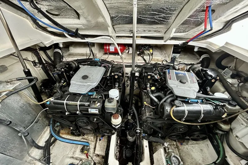  Yacht Photos Pics Engine compartment of a 2009 Sea Ray 310 Sundancer boat, showcasing dual engines.