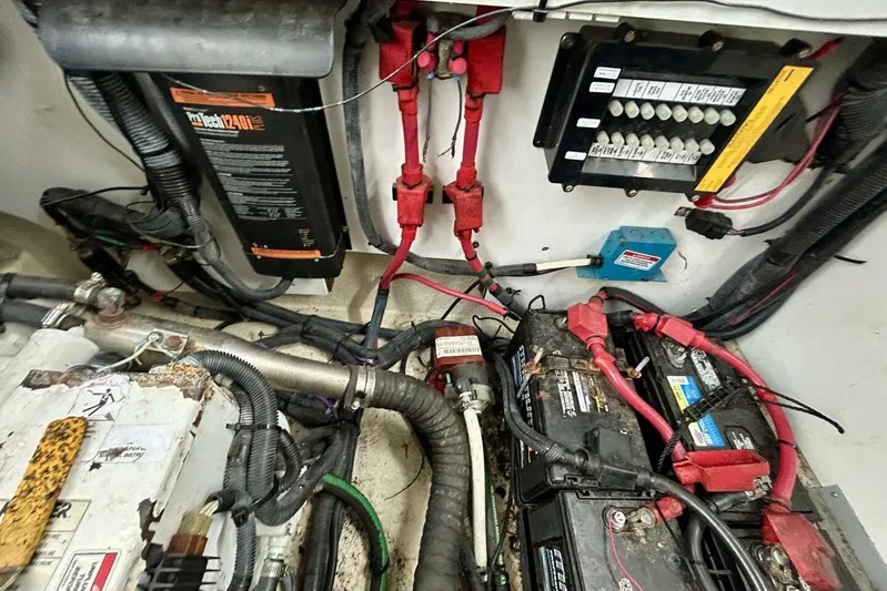  Yacht Photos Pics Engine compartment of a 2009 Sea Ray 310 Sundancer with batteries and wiring.