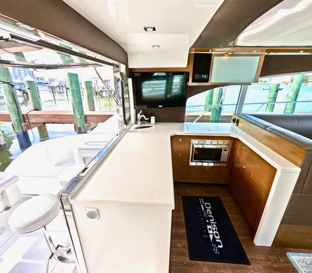  Yacht Photos Pics Interior of 2016 Cruisers Yachts Cantius 45, featuring modern kitchen and sleek design.
