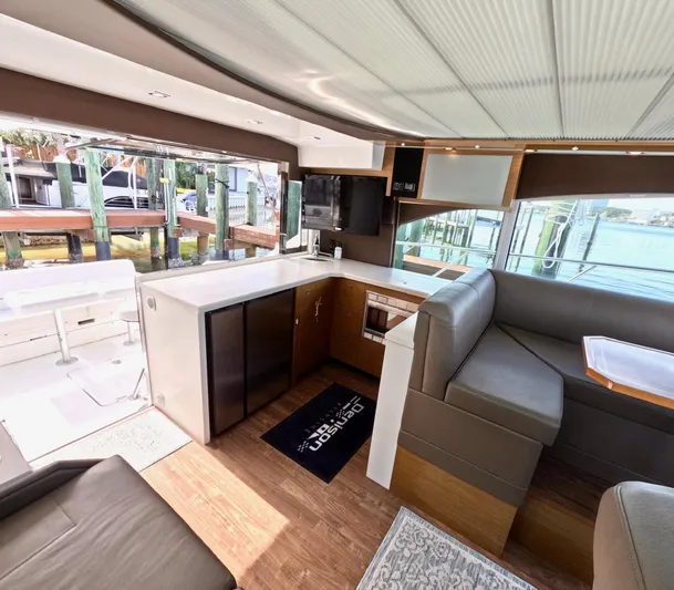 Yacht Photos Pics 2016 Cruisers Yachts Cantius 45 interior with modern kitchen and seating area.