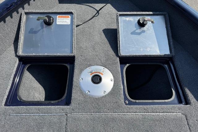 2023 Tracker Pro Guide V-16 WT boat deck with storage compartments.