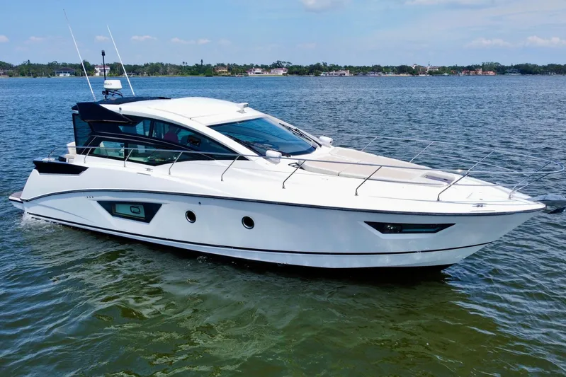  Yacht Photos Pics 2018 Beneteau Gran Turismo 46 yacht cruising on calm waters.