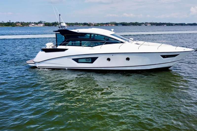  Yacht Photos Pics 2018 Beneteau Gran Turismo 46 yacht cruising on calm waters.