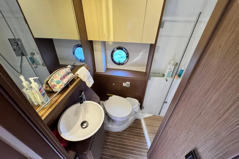  Yacht Photos Pics Luxurious bathroom in 2018 Beneteau Gran Turismo 46 yacht with modern amenities.