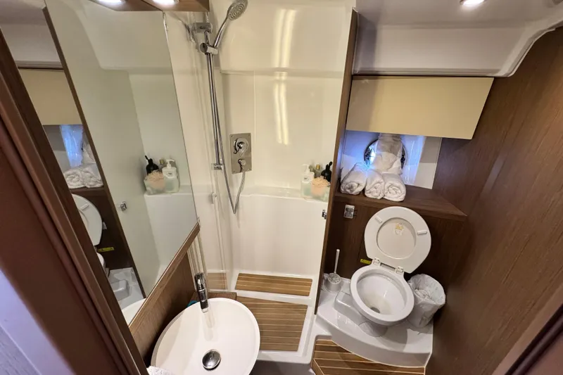  Yacht Photos Pics Luxurious bathroom in 2018 Beneteau Gran Turismo 46 yacht with shower and toilet.