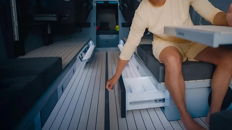 C´est Normal Yacht Photos Pics Built-In Fridge on the 2022 C’est Normal 52R Hybrid – Luxury and Convenience at Sea