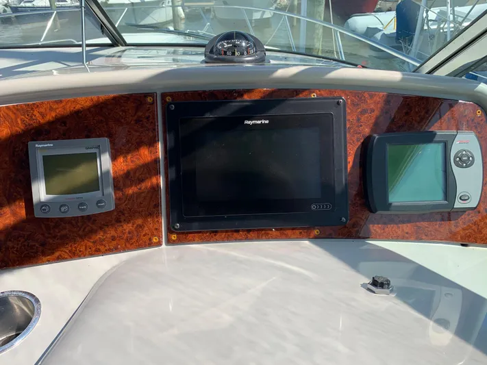  Yacht Photos Pics Dashboard of a 2005 Formula 34 PC boat with navigation and control systems.