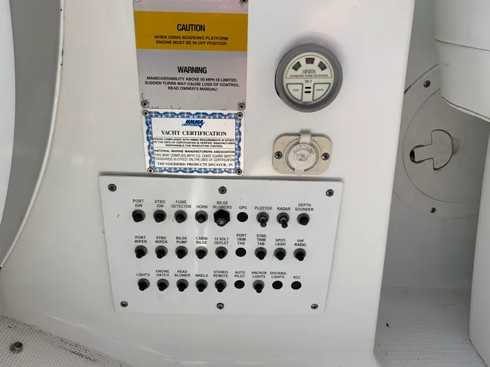  Yacht Photos Pics Control panel of a 2005 Formula 34 Performance Cruiser with switches and gauges.