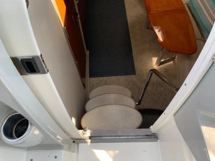  Yacht Photos Pics 2005 Formula 34 Performance Cruiser interior with stairs and seating area.