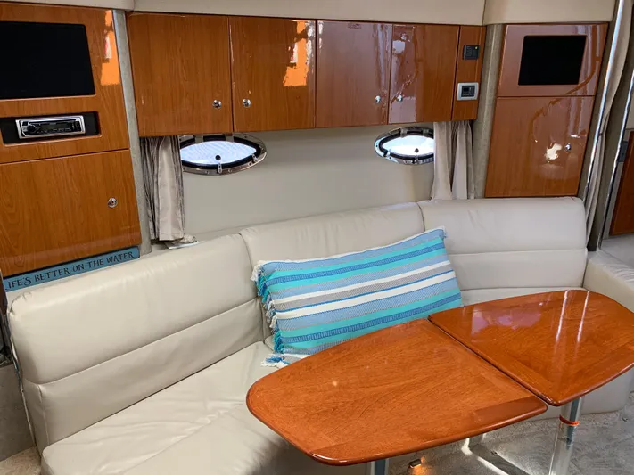  Yacht Photos Pics Interior of 2005 Formula 34 Performance Cruiser with leather seating and wooden cabinetry.