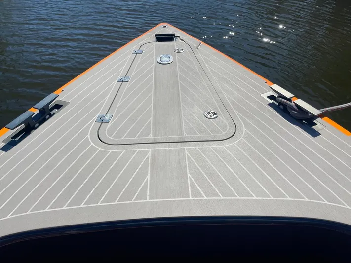  Yacht Photos Pics VanDutch 40 Open Bow 2013 yacht deck with sleek design on calm water.