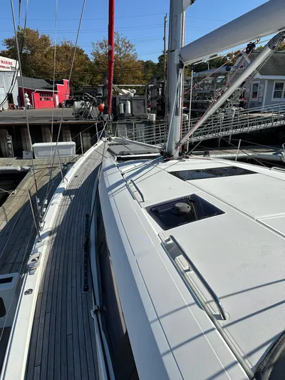  Yacht Photos Pics 2018 Jeanneau 51 sailboat docked, showcasing sleek deck design and modern rigging.