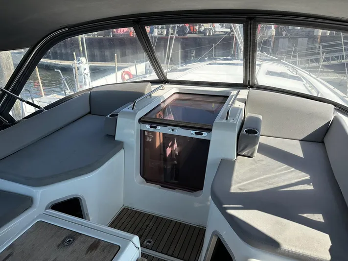  Yacht Photos Pics 2018 Jeanneau 51 yacht cockpit with cushioned seating and sleek design.