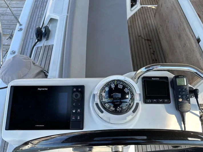  Yacht Photos Pics Cockpit of 2018 Jeanneau 51 sailboat with navigation instruments and compass.