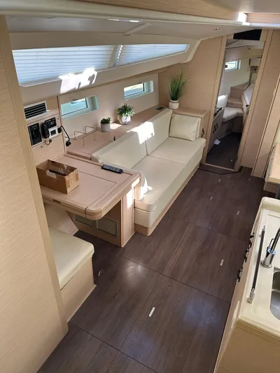  Yacht Photos Pics Interior of 2018 Jeanneau 51 yacht with modern furnishings and natural light.