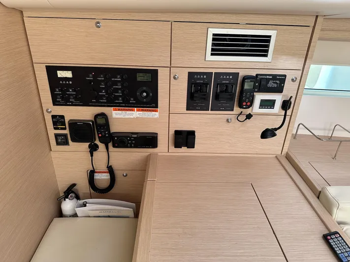  Yacht Photos Pics Control panel of a 2018 Jeanneau 51 yacht, featuring navigation and communication equipment.