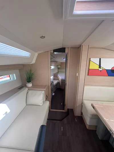  Yacht Photos Pics Interior of 2018 Jeanneau 51 yacht with modern furnishings and natural light.