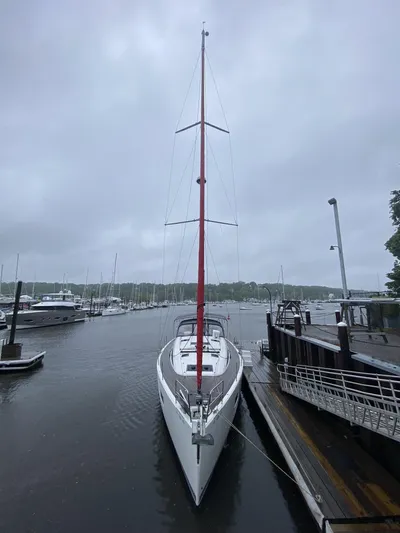  Yacht Photos Pics 2018 Jeanneau 51 sailboat docked on a cloudy day.