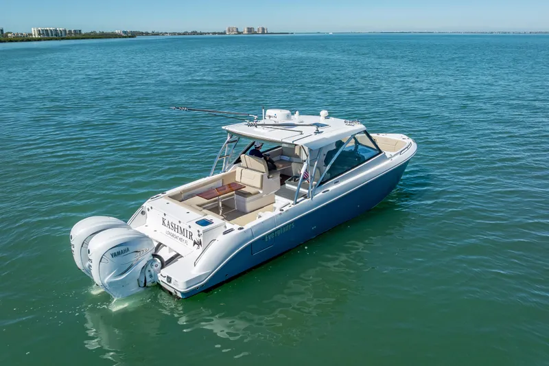 Kashmir Yacht Photos Pics 2019 Everglades 340 Dual Console boat on calm blue water.