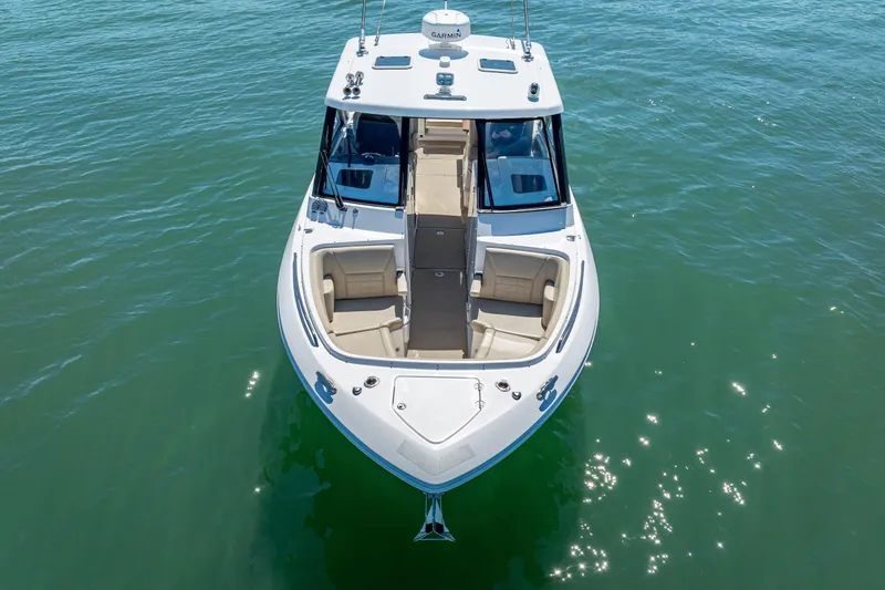 Kashmir Yacht Photos Pics 2019 Everglades 340 Dual Console boat on clear water, aerial view.