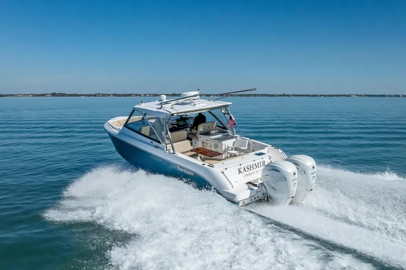 Kashmir Yacht Photos Pics 2019 Everglades 340 Dual Console boat cruising on open water.