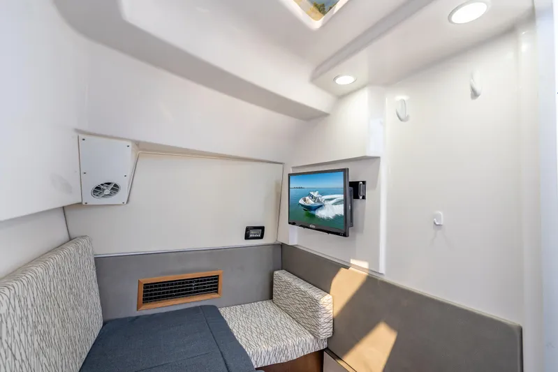 Kashmir Yacht Photos Pics Interior cabin of 2019 Everglades 340 Dual Console with TV and seating area.