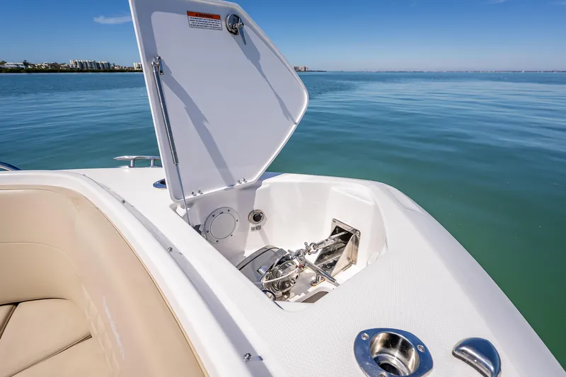 Kashmir Yacht Photos Pics 2019 Everglades 340 Dual Console boat with open anchor compartment on calm water.