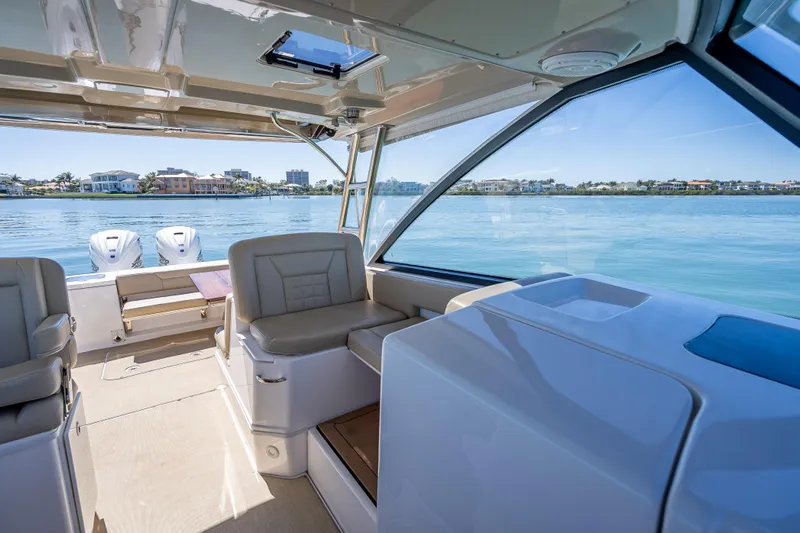 Kashmir Yacht Photos Pics Interior of 2019 Everglades 340 Dual Console boat with scenic water view.