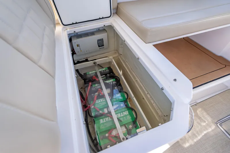 Kashmir Yacht Photos Pics Battery compartment of 2019 Everglades 340 Dual Console boat, showcasing multiple batteries.