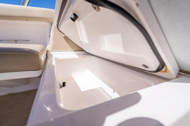Kashmir Yacht Photos Pics Open storage compartment on 2019 Everglades 340 Dual Console boat interior.