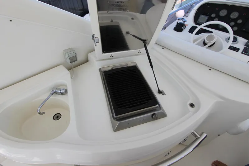 Sevrik Yacht Photos Pics 2004 Azimut 62 yacht interior with sink and grill station.