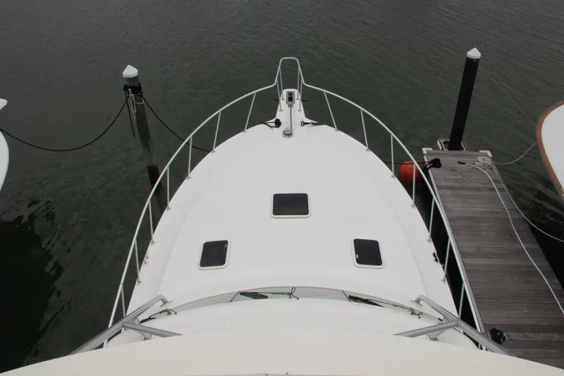 Peixe Espada Yacht Photos Pics Top view of 2016 Henriques 42 Express Hardtop docked at marina.
