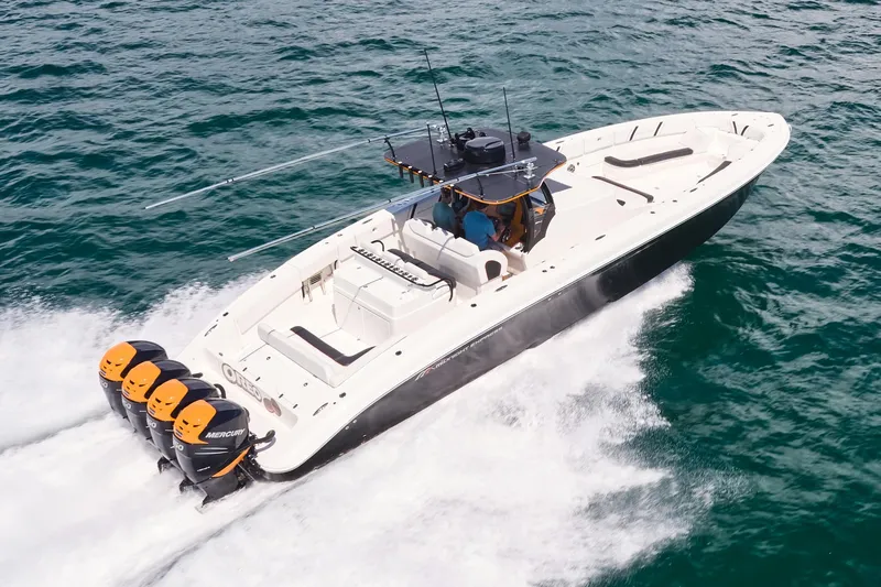  Yacht Photos Pics 2016 Midnight Express 43' Open boat cruising on the ocean with four engines.