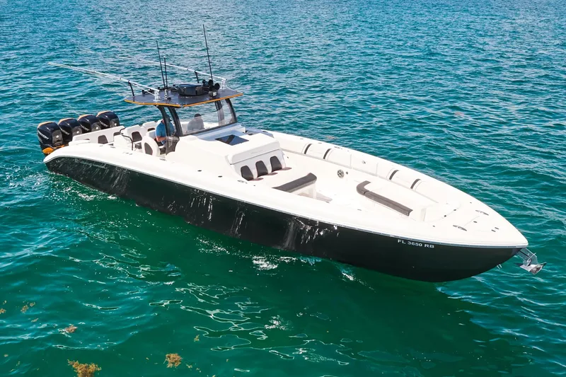  Yacht Photos Pics 2016 Midnight Express 43' Open boat cruising on clear blue water.