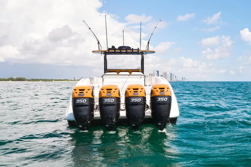  Yacht Photos Pics 2016 Midnight Express 43' Open boat with four powerful engines on the ocean.