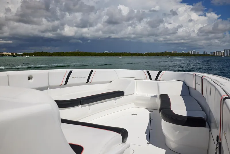  Yacht Photos Pics 2016 Midnight Express 43' Open boat with spacious seating on a sunny day.